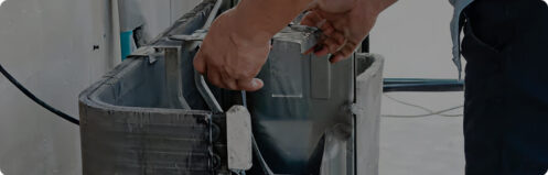 HVAC technician checking refrigerant leak in Tampa, FL