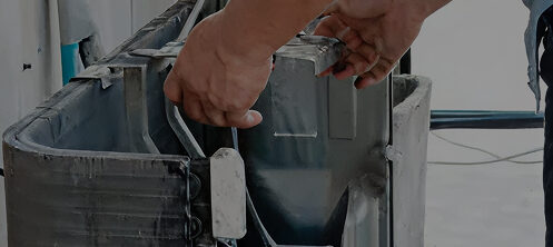 HVAC technician checking refrigerant leak in Tampa, FL