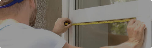 Installer measuring a window in Tampa FL
