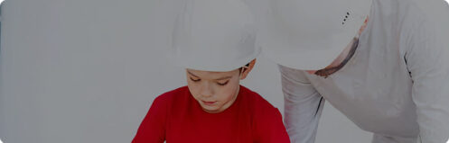 Father and son working on a project together