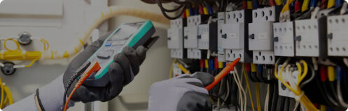 Electrician checking electrical boxes