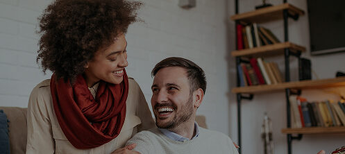 Happy interracial couple enjoying time in their Sarasota, FL home