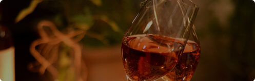 Glasses clinking together in a fancy restaurant