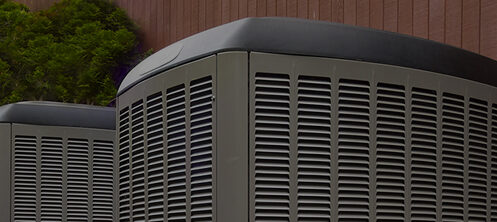 Heat pump and AC HVAC units outside a Florida home