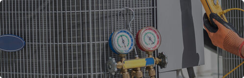 HVAC technician servicing maintenance to an AC unit