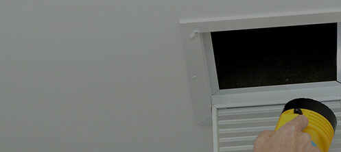 Flashlight shining inside an open air duct